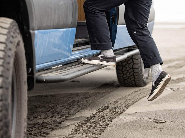 Person stepping on side step