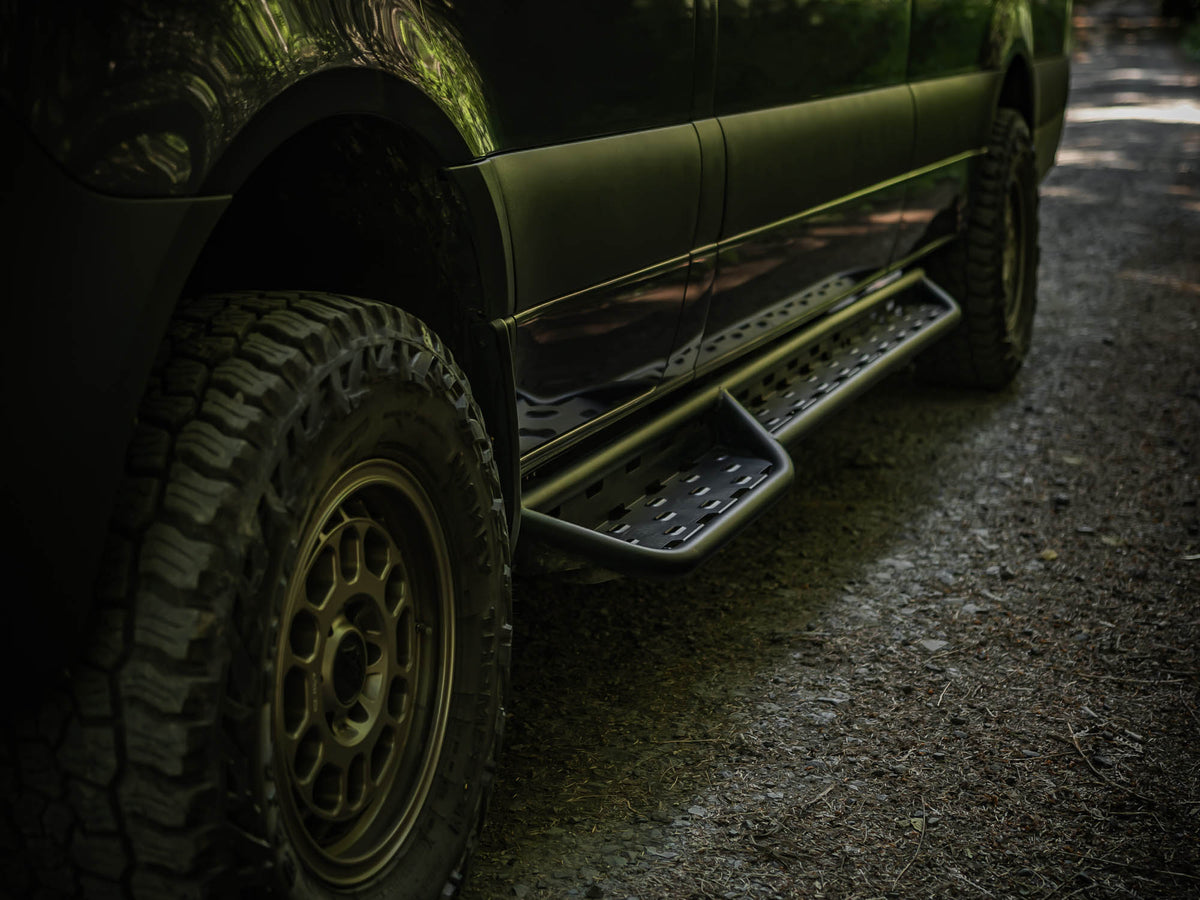 Close-up of the alloy low step tread and drop bracket